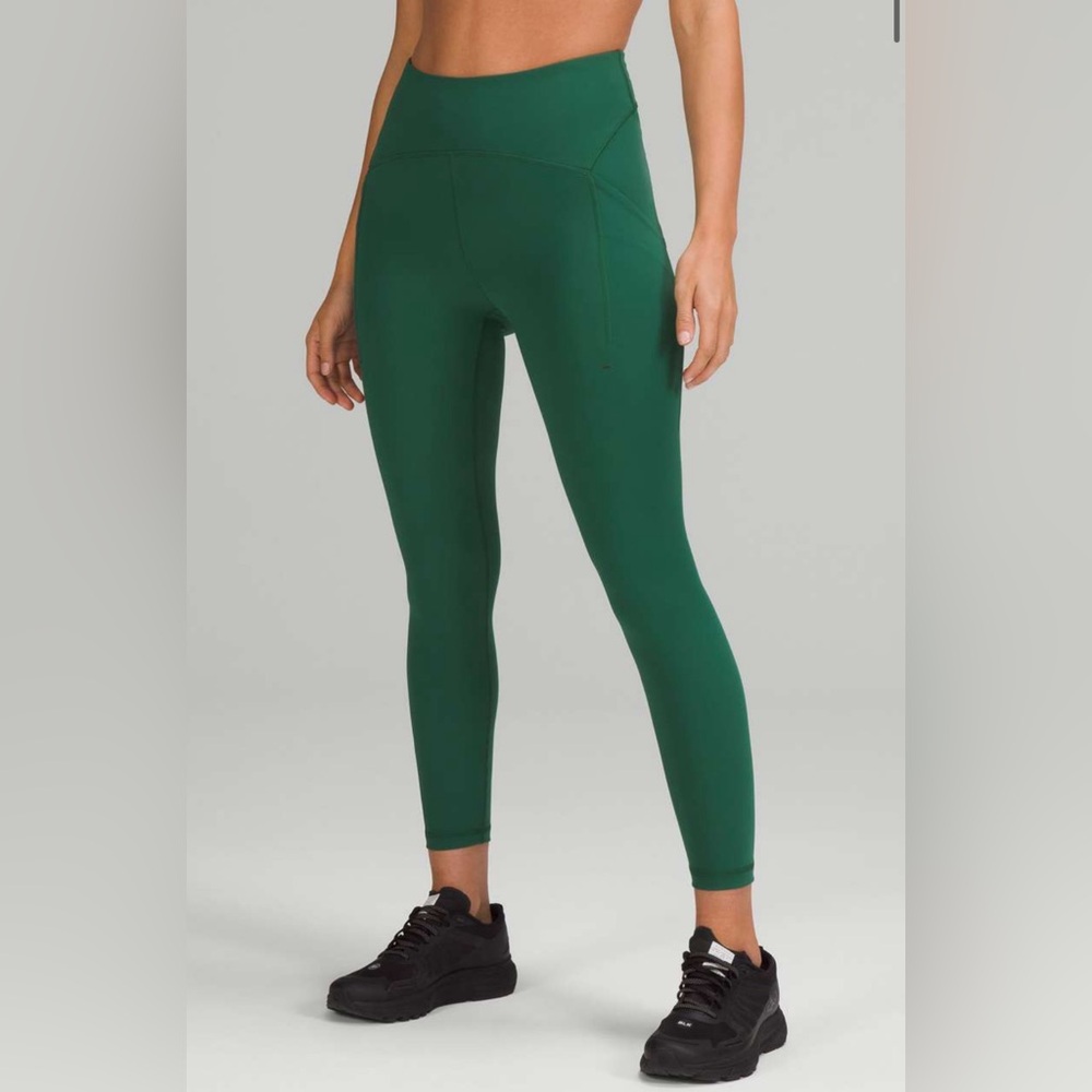 Everglade green high-rise lululemon leggings with side pockets, size 2